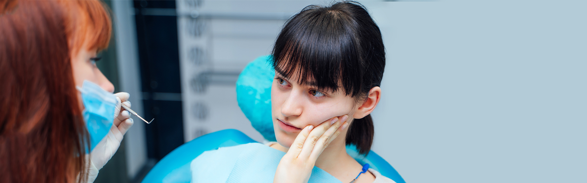 Brampton dentist treating emrgency dental treament to their patient