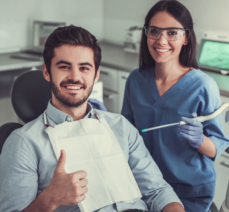 Brampton dentist treating her patient